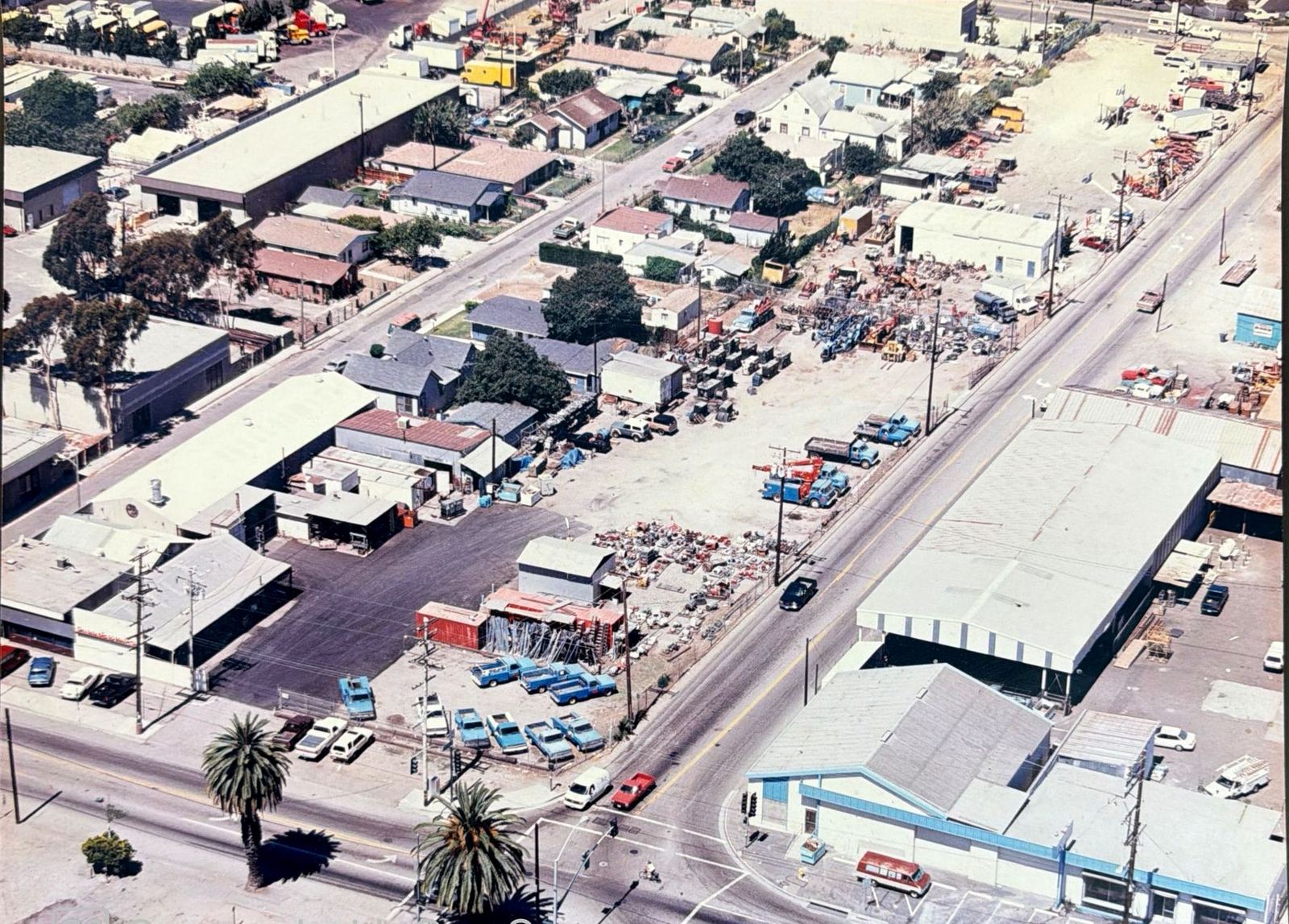 Aerial view of the OEC yard and blue truck fleet on N Ventura Avenue in Ventura